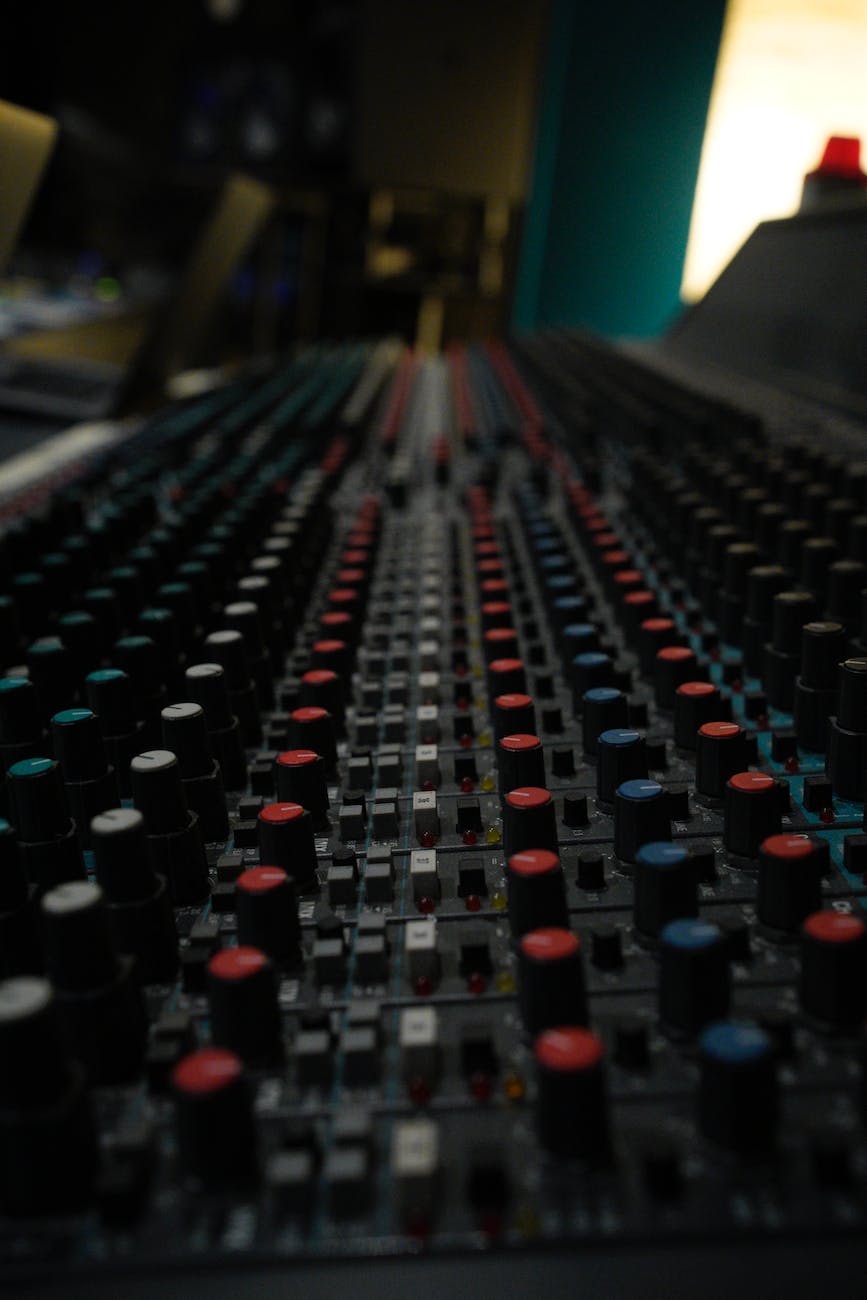 close up of buttons on a console in a music studio